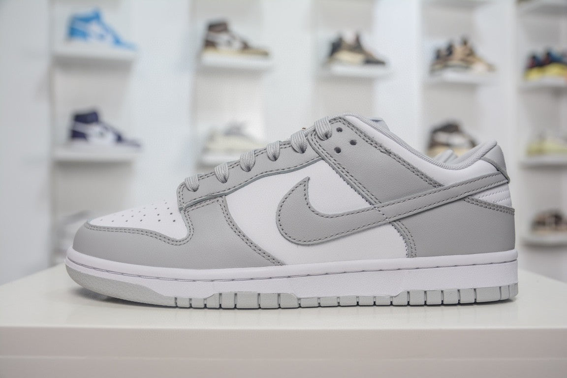 NIKE DUNK LOW RETRO GREY FOG - lateral com ponta para esquerda