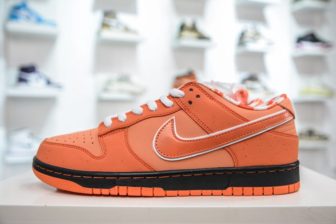 CONCEPTS x NIKE SB DUNK LOW ORANGE LOBSTER - lateral oposta