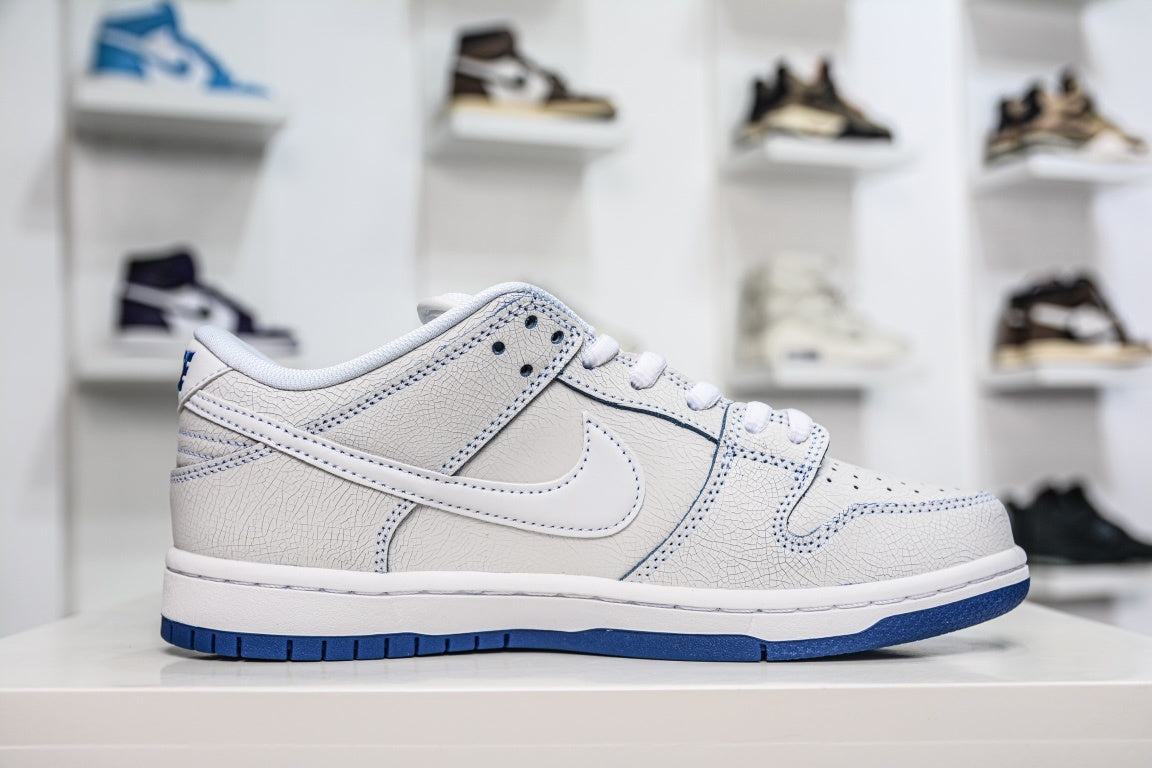 NIKE SB DUNK LOW PREMIUM WHITE GAME ROYAL - lateral
