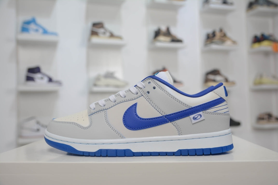 NIKE DUNK LOW WORLDWIDE PACK WHITE GAME ROYAL - lateral oposta